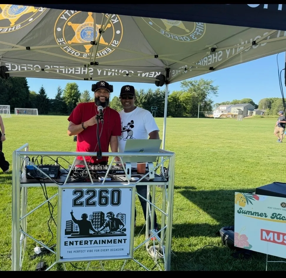 DJ mixing music in front of party guests